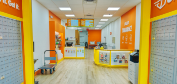Oh Ship! mailbox rental facility in Tamarac, FL, with package lockers and reception desk.
