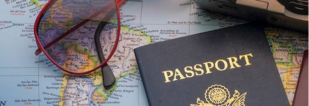 Passport and map illustrating passport photo services at Oh Ship! in Tamarac, FL.